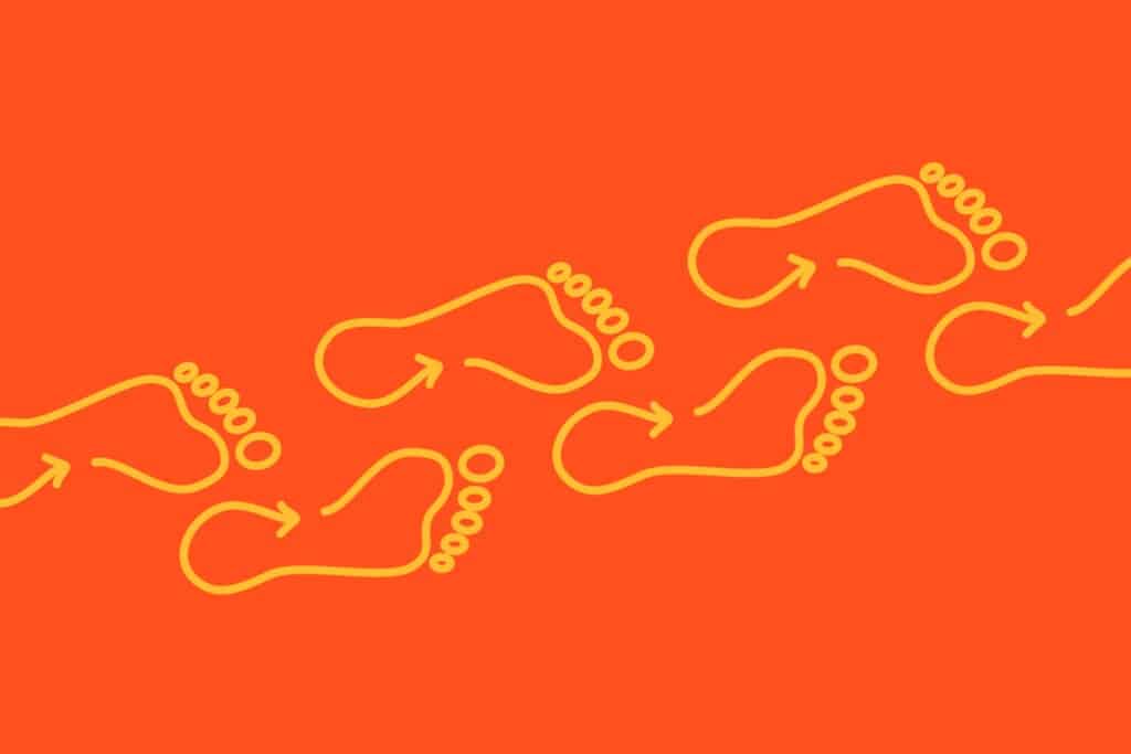 Illustration of footsteps walking diagonally across an orange background