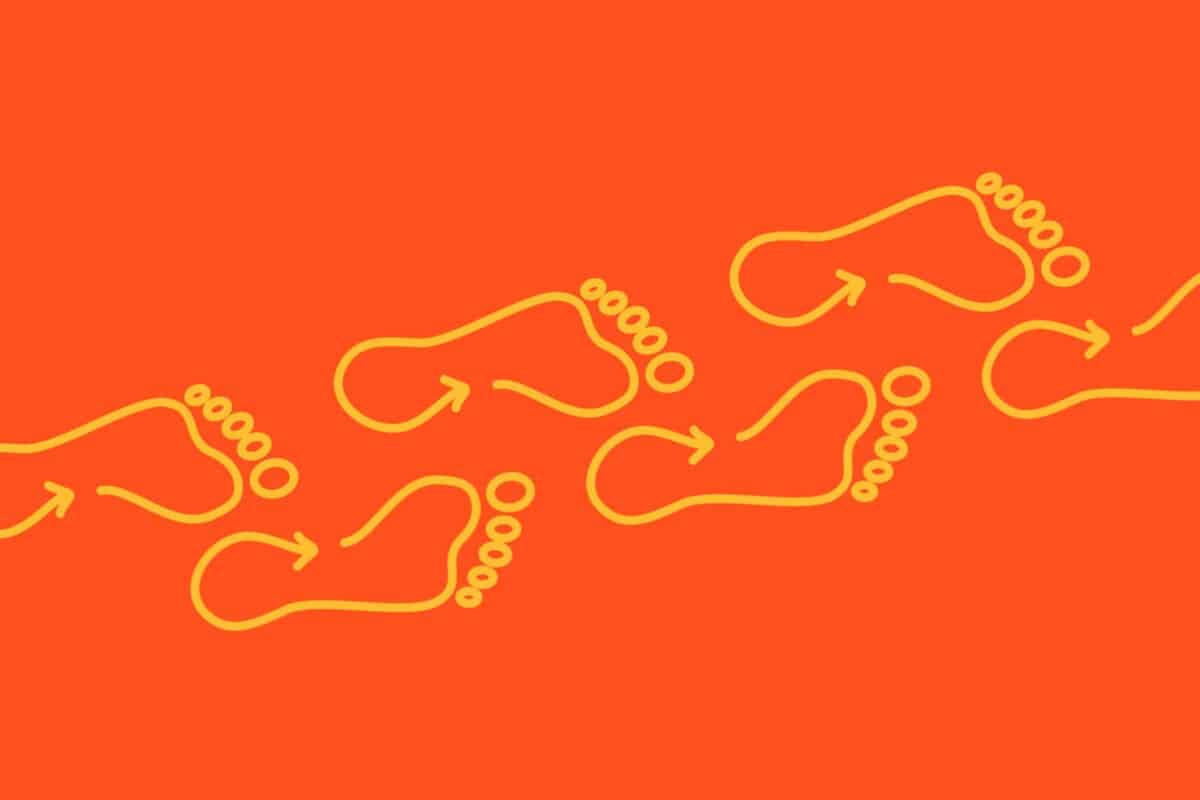 Illustration of footsteps walking diagonally across an orange background