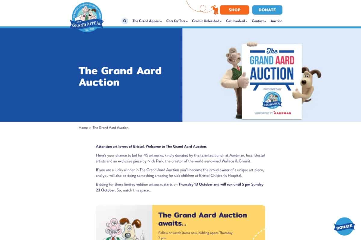 Screenshot of The Grand Appeal's WordPress and WooCommerce site showing charity auction to support Giving Tuesday blog post