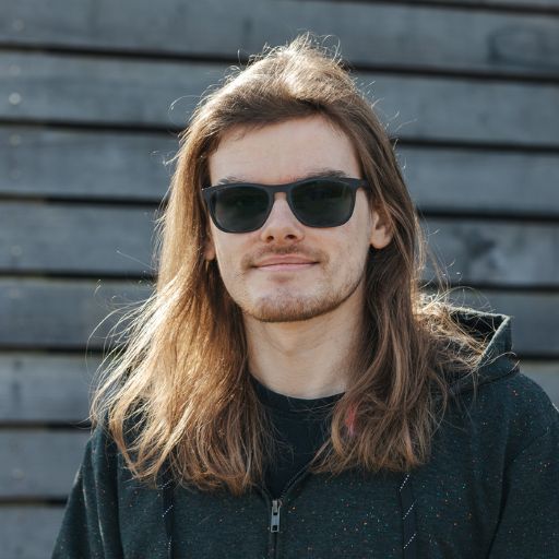 Headshot of Mikey stood outdoors