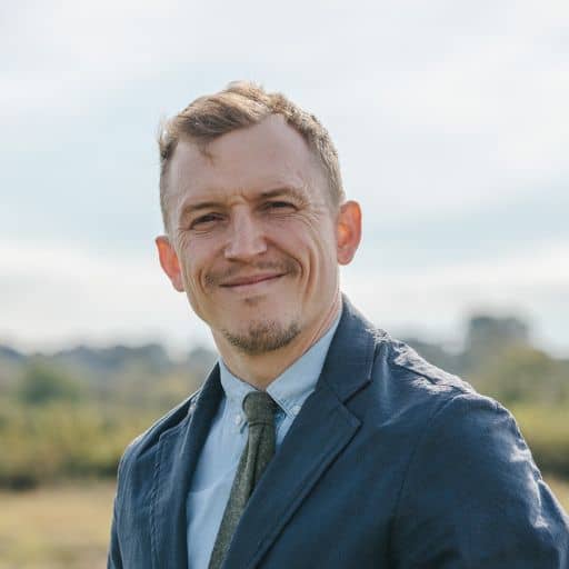 Headshot of Piers stood outdoors