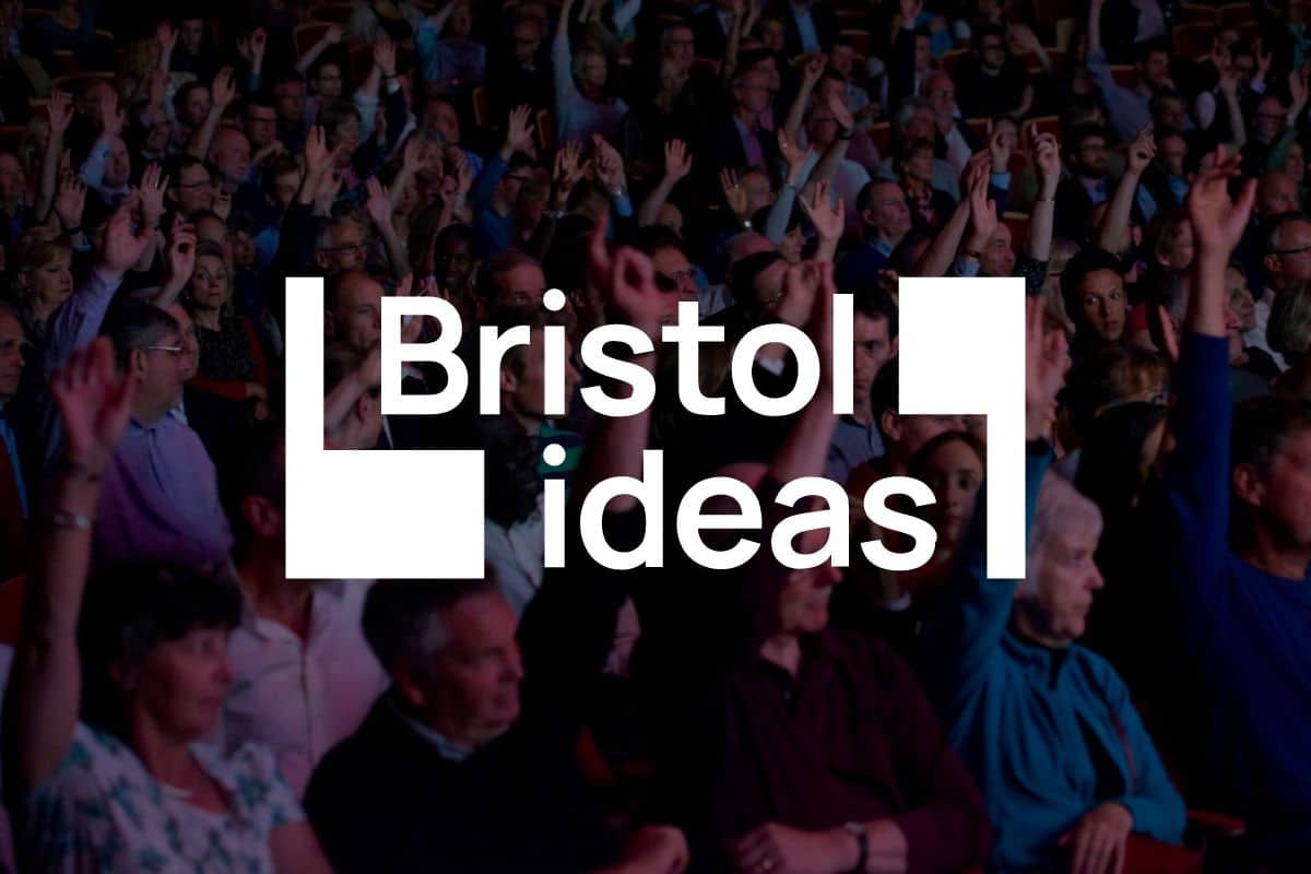 Bristol Ideas logo in front of photo of people at event