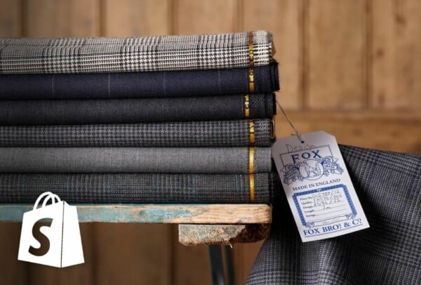 Image of The Merchant Fox products sold on their Shopify site, along with the Shopify logo