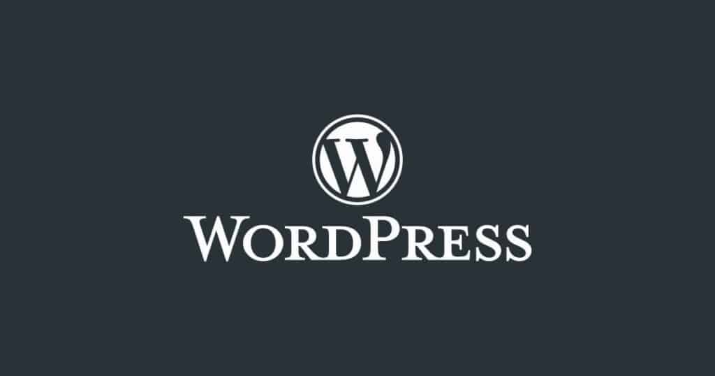 WordPress logo in white against a charcoal background