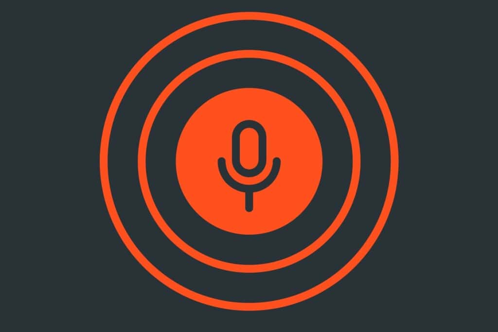 Illustration of a microphone with circles radiating outside of it to accompany a blog post about optimising WordPress for voice search