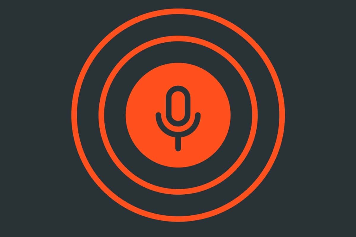 Illustration of a microphone with circles radiating outside of it to accompany a blog post about optimising WordPress for voice search