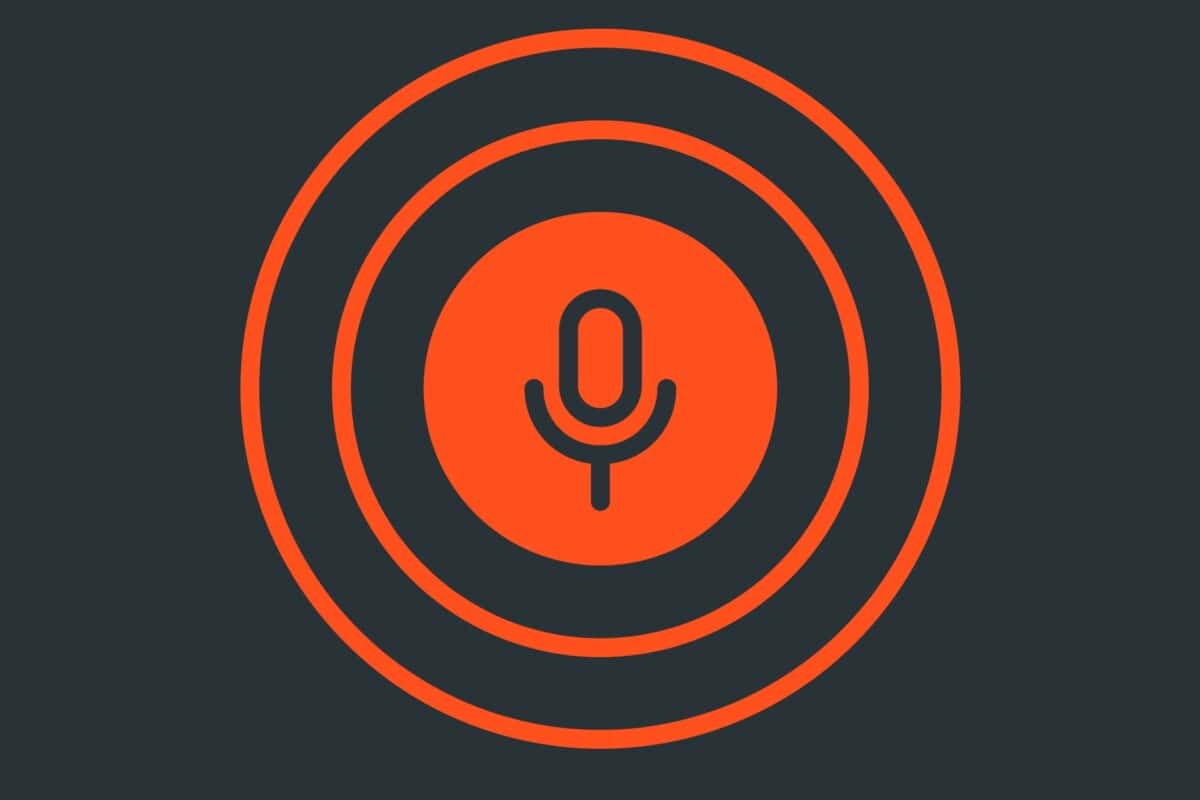 Illustration of a microphone with circles radiating outside of it to accompany a blog post about optimising WordPress for voice search