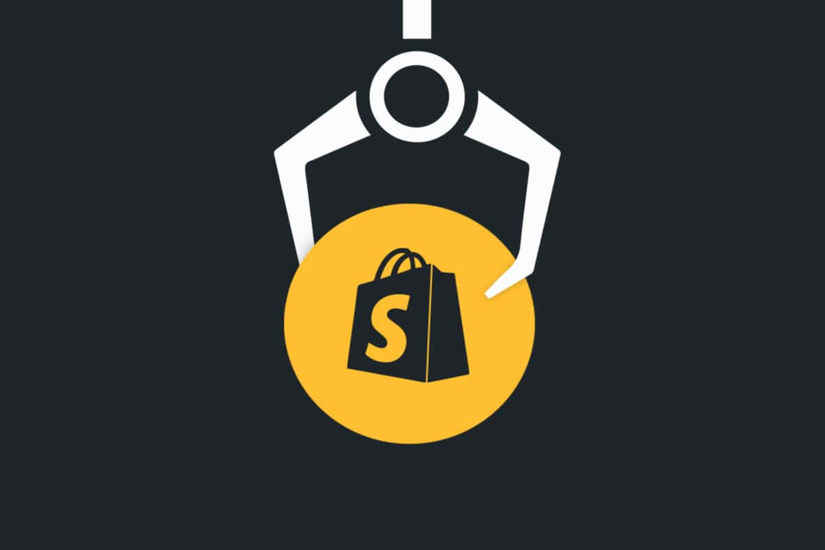 Illustration of Shopify logo being picked up in arcade game to accompany article about Shopify sites we love
