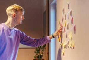 Duncan with post-it notes in team meeting