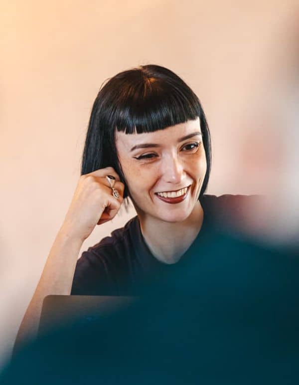 Beth in team meeting